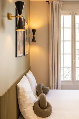 Un ou plusieurs lits dans un hébergement de l'établissement Stylish & Cozy Air-Conditioned Studio