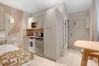 Cuisine ou kitchenette dans l'établissement Havre climatisé au cœur de Neuilly