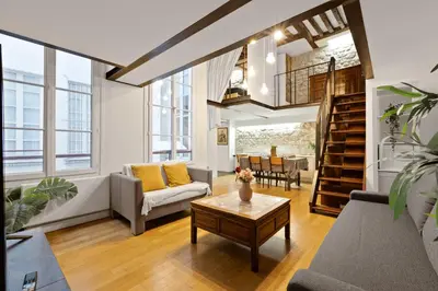 Coin salon dans l'établissement Quartier Musée du Louvre - 2 Bedroom Apartment Free NetFlix