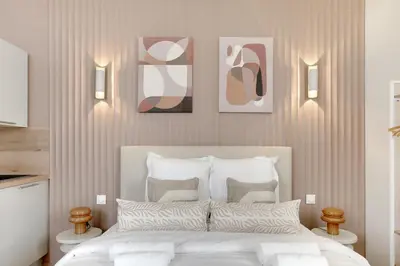 Un ou plusieurs lits dans un hébergement de l'établissement Modern, Cozy Studio with AC in Neuilly Area