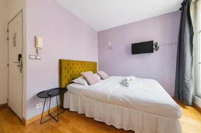 Un ou plusieurs lits dans un hébergement de l'établissement 304 - Charmant studio jardins des plantes -Paris 5