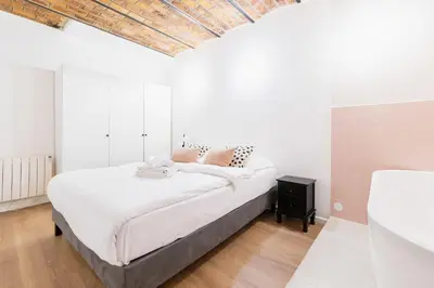 Un ou plusieurs lits dans un hébergement de l'établissement Logement Premium avec Grande Salle de Bain - 6P