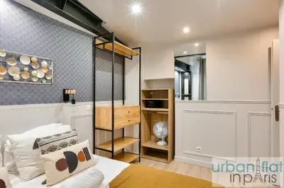 Un ou plusieurs lits dans un hébergement de l'établissement UrbanFlat 44 - Appartement 2 chambres - En pleins centre