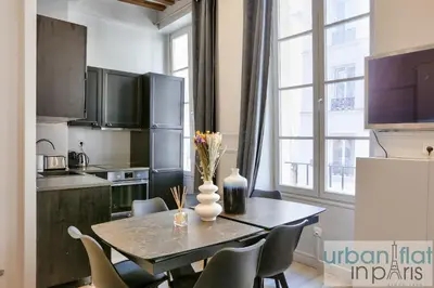 Cuisine ou kitchenette dans l'établissement UrbanFlat 44 - Appartement 2 chambres - En pleins centre