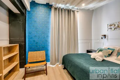 Un ou plusieurs lits dans un hébergement de l'établissement UrbanFlat 44 - Appartement 2 chambres - En pleins centre