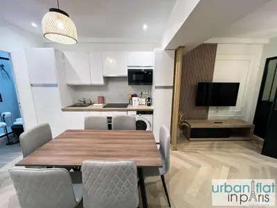 Télévision ou salle de divertissement dans l'établissement UrbanFlat 178 - Cosy 2 Bedroom in the center of Paris