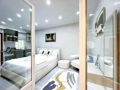 Un ou plusieurs lits dans un hébergement de l'établissement UrbanFlat 11 - Grand Studio Pereire Wagram - Champs-Elysees