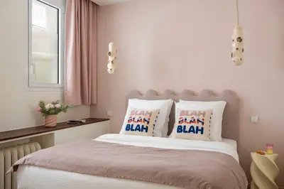 Un ou plusieurs lits dans un hébergement de l'établissement The Yummy Loft - Boulogne