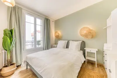 Un ou plusieurs lits dans un hébergement de l'établissement Le Nid Ambré, apaisant 15 min Paris