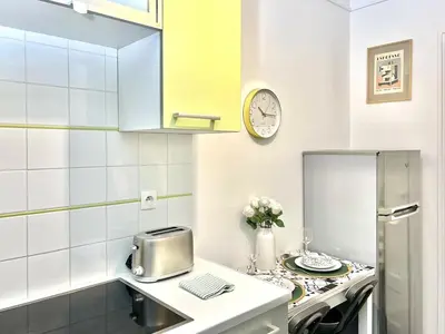 Cuisine ou kitchenette dans l'établissement Montrouge Cocon Studio Teletravail Metro L4