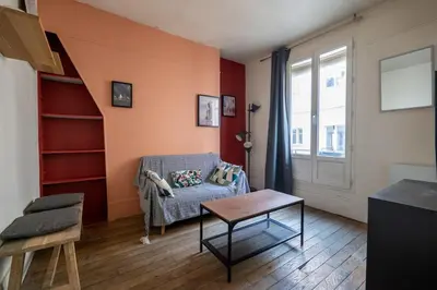 Coin salon dans l'établissement Appartement proche Sacré Coeur Paris 18