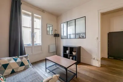 Coin salon dans l'établissement Appartement proche Sacré Coeur Paris 18