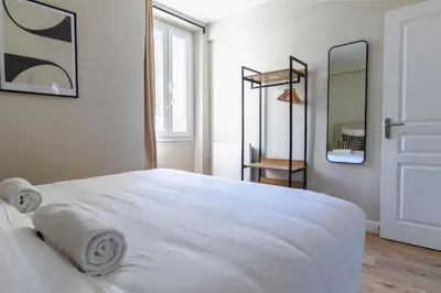 Un ou plusieurs lits dans un hébergement de l'établissement Charmant T2 climatisé, Marais