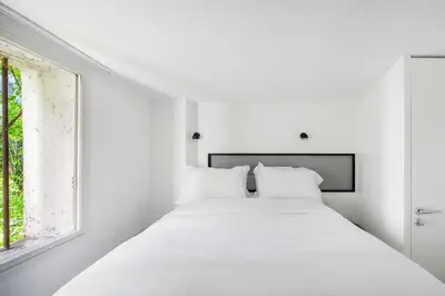 Un ou plusieurs lits dans un hébergement de l'établissement Luxury apartment 4BR-8P - Notre Dame-Bastille
