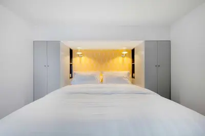 Un ou plusieurs lits dans un hébergement de l'établissement Luxury apartment 4BR-8P - Notre Dame-Bastille