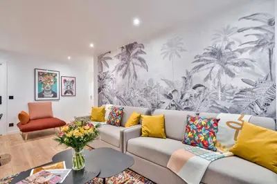 Coin salon dans l'établissement UrbanFlat 103 - Grand appartement - Grands Boulevards