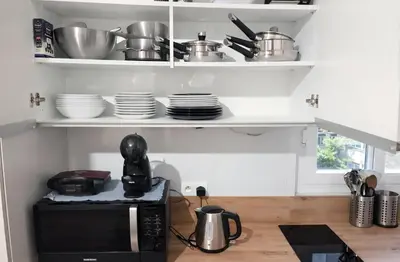Cuisine ou kitchenette dans l'établissement Élégant Studio • Arc de Triomphe / Champs-Élysées