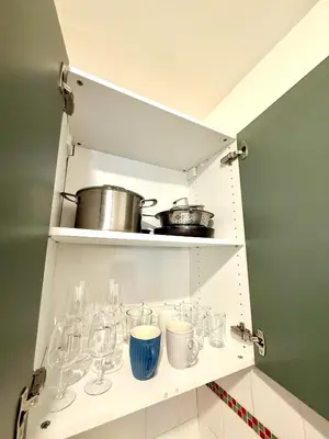 Cuisine ou kitchenette dans l'établissement Appartement Popincourt Republique Paris
