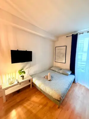 Un ou plusieurs lits dans un hébergement de l'établissement Appartement Popincourt Republique Paris