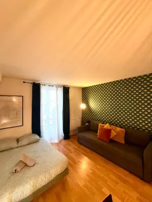 Coin salon dans l'établissement Appartement Popincourt Republique Paris