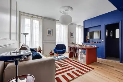 Télévision ou salle de divertissement dans l'établissement Saint Placide II Suite