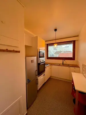 Cuisine ou kitchenette dans l'établissement Tour Eiffel Yvart Vaugirard Paris