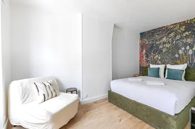 Un ou plusieurs lits dans un hébergement de l'établissement Appartement proche de Paris Près Saint Gervais- IV