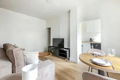 Coin salon dans l'établissement Appartement proche de Paris Près Saint Gervais- IV