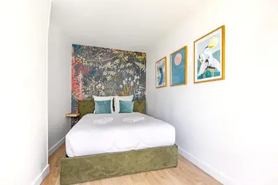 Un ou plusieurs lits dans un hébergement de l'établissement Appartement proche de Paris Près Saint Gervais- IV