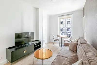 Télévision ou salle de divertissement dans l'établissement Appartement proche de Paris Près Saint Gervais- IV