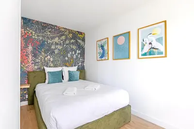 Un ou plusieurs lits dans un hébergement de l'établissement Appartement proche de Paris Près Saint Gervais- IV