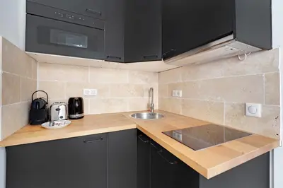 Cuisine ou kitchenette dans l'établissement Charming Apartment in the heart of Le Marais