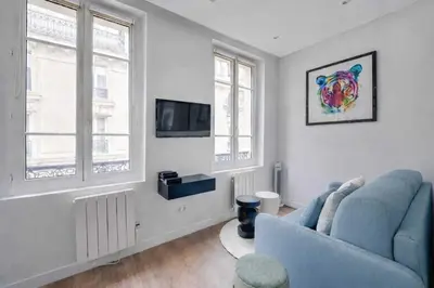 Télévision ou salle de divertissement dans l'établissement Charming Apartment in the heart of Le Marais