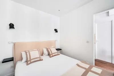 Un ou plusieurs lits dans un hébergement de l'établissement Charming Apartment in the heart of Le Marais