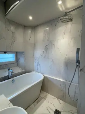 Salle de bains dans l'établissement Appartement unique au coeur du marais