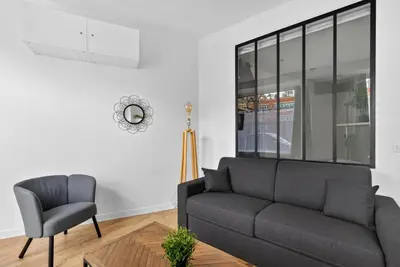 Coin salon dans l'établissement Charming 2-room loft-style apartment near Montmartre
