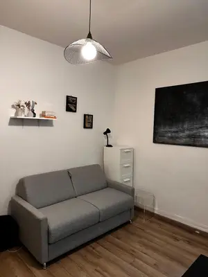 Coin salon dans l'établissement Studio Buttes aux cailles - Weber Home
