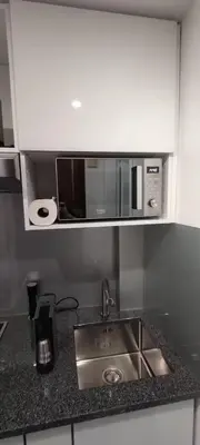 Cuisine ou kitchenette dans l'établissement Superbe studio dans une résidence calme