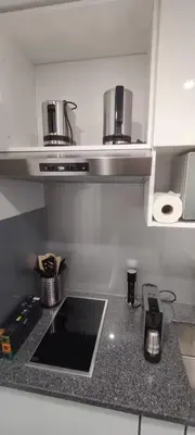 Cuisine ou kitchenette dans l'établissement Superbe studio dans une résidence calme