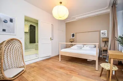 Un ou plusieurs lits dans un hébergement de l'établissement Elegant apartment - 3BR-8P - Gare de l'est