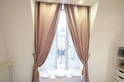 Un ou plusieurs lits dans un hébergement de l'établissement Studio parisien face metro Pigalle - Paris 9 - 2p