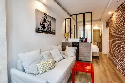 Coin salon dans l'établissement Appartement Chaussee d'Antin - Mogador - Paris 9