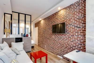 Télévision ou salle de divertissement dans l'établissement Appartement Chaussee d'Antin - Mogador - Paris 9