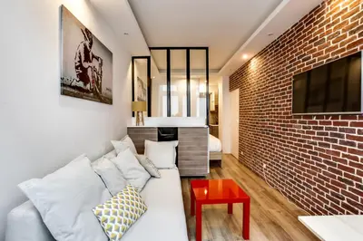 Télévision ou salle de divertissement dans l'établissement Appartement Chaussee d'Antin - Mogador - Paris 9