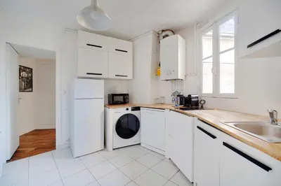 Cuisine ou kitchenette dans l'établissement Modern apartment 1BDR 4P - Alésia