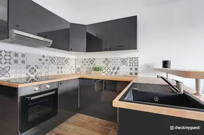 Cuisine ou kitchenette dans l'établissement Cozy apartment - 1BR 4P - next to Paris