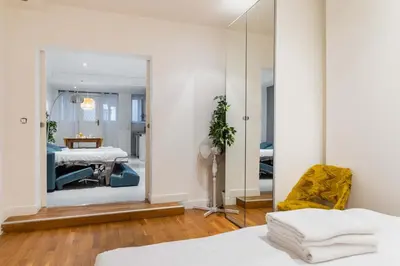Un ou plusieurs lits dans un hébergement de l'établissement Loft moderne face jardin des plantes - 4P