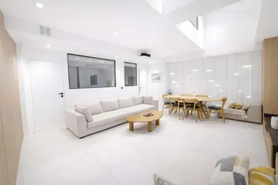 Coin salon dans l'établissement Duplex elegant au coeur du Marais avec cinema - 6P