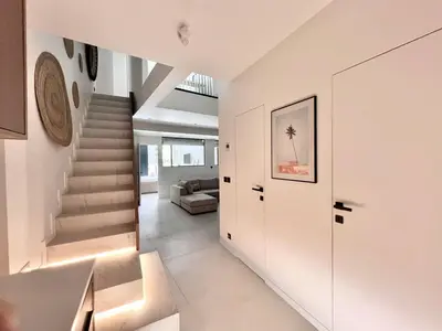 Coin salon dans l'établissement Duplex elegant au coeur du Marais avec cinema - 6P