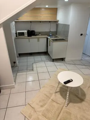 Cuisine ou kitchenette dans l'établissement La Maison Cachée moderne